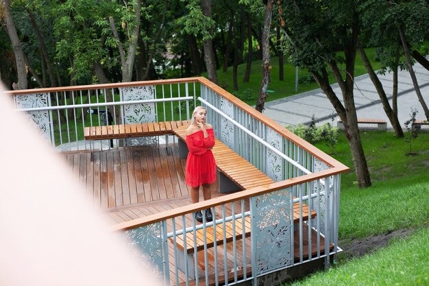 tender-blonde-woman-wearing-fashionable-red-dress-posing-wooden-bridge-with-railing_172420-10089.jpg tender-blonde-woman-wearing-fashionable-red-dress-posing-wooden-bridge-with-railing_172420-10089.jpg