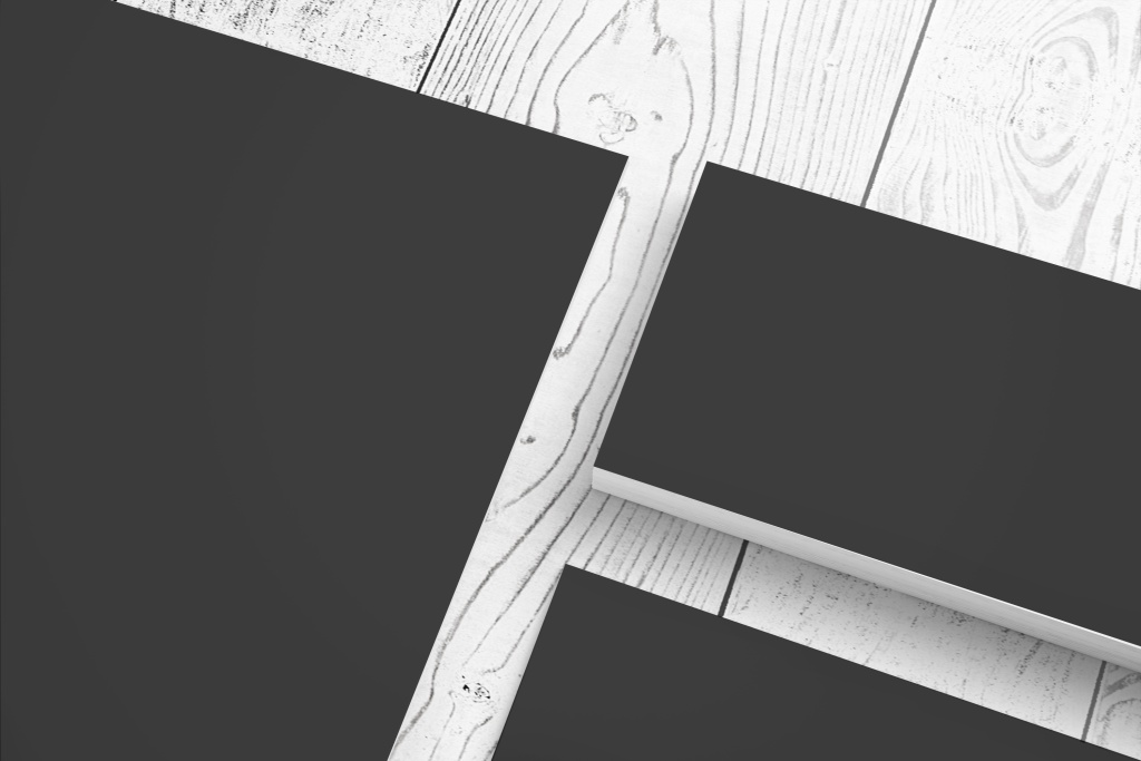 blank-black-paper-stationery-set-wooden-desk-clode-up-view.jpg
